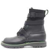 A black leather ankle boot with multiple adjustable straps and bright green contrast stitching, shown from a side profile on a white background.