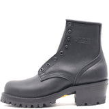 A black leather ankle boot with a chunky lug sole and a low block heel, featuring metal eyelets and a debossed 'KICKS' logo on the side, shown against a plain white background.
