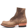 A single brown leather lace-up ankle boot with a rugged sole and stacked heel, shown from a side profile on a white background.