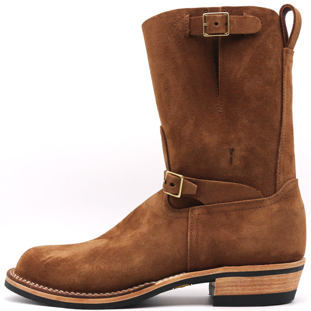 A brown suede mid-calf western boot with gold-tone buckle straps, a pull tab, and a stacked wood-look heel, shown from a side profile on a white background.