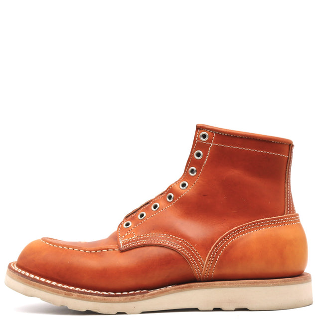 A single high-top leather boot in a warm cognac brown, shown in a side profile against a solid white background.