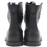 A pair of black leather ankle boots shown from the back, featuring silver metal studs along the sides and pull tabs at the top, set against a plain white background.