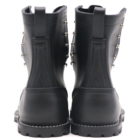 A pair of black leather ankle boots shown from the back, featuring silver metal studs along the sides and pull tabs at the top, set against a plain white background.