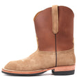 A single brown leather cowboy boot shown in profile against a plain white background. The boot features a tan suede-like lower section with white decorative stitching, a medium brown shaft, and a pull tab on the back.