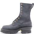 A dark gray suede lace-up work boot with gold-tone eyelets, a thick black lug sole, and 'NICKS' embossed on the side, shown against a plain white background.