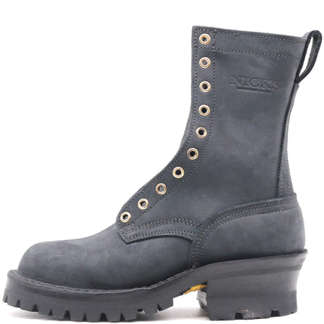 A dark gray suede lace-up work boot with gold-tone eyelets, a thick black lug sole, and 'NICKS' embossed on the side, shown against a plain white background.