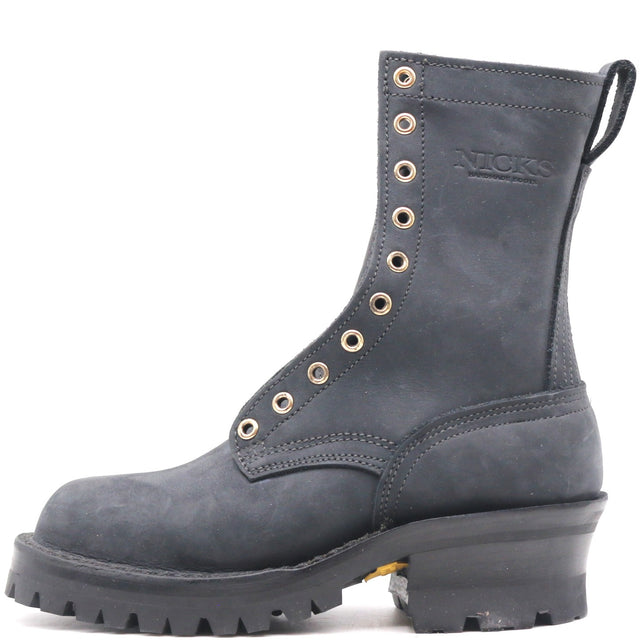 A dark gray suede lace-up work boot with gold-tone eyelets, a thick black lug sole, and 'NICKS' embossed on the side, shown against a plain white background.