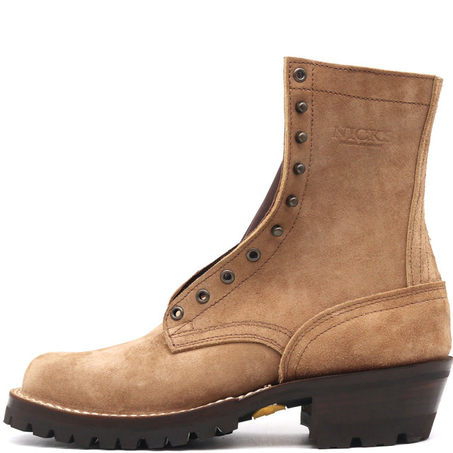 A single tan suede lace-up work boot with a dark brown lug sole and heel, shown from a side profile on a white background. The brand name 'NICKS' is embossed on the side collar.