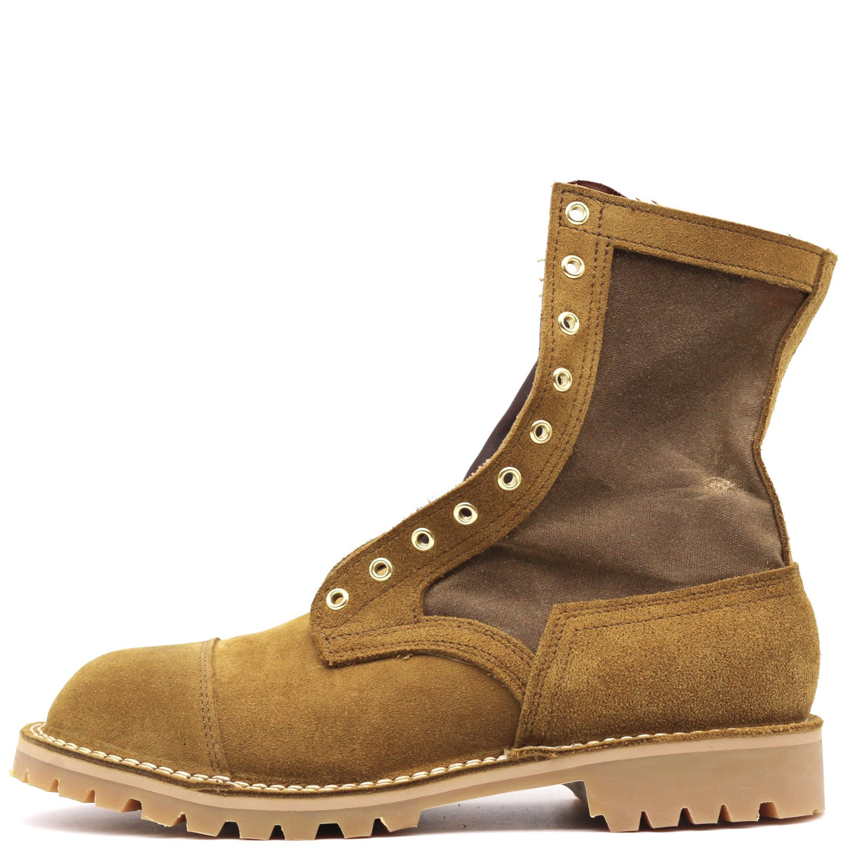 A single mid-calf lace-up boot in tan suede and dark brown fabric, featuring brass-tone metal eyelets and a chunky lug sole, shown against a plain white background.