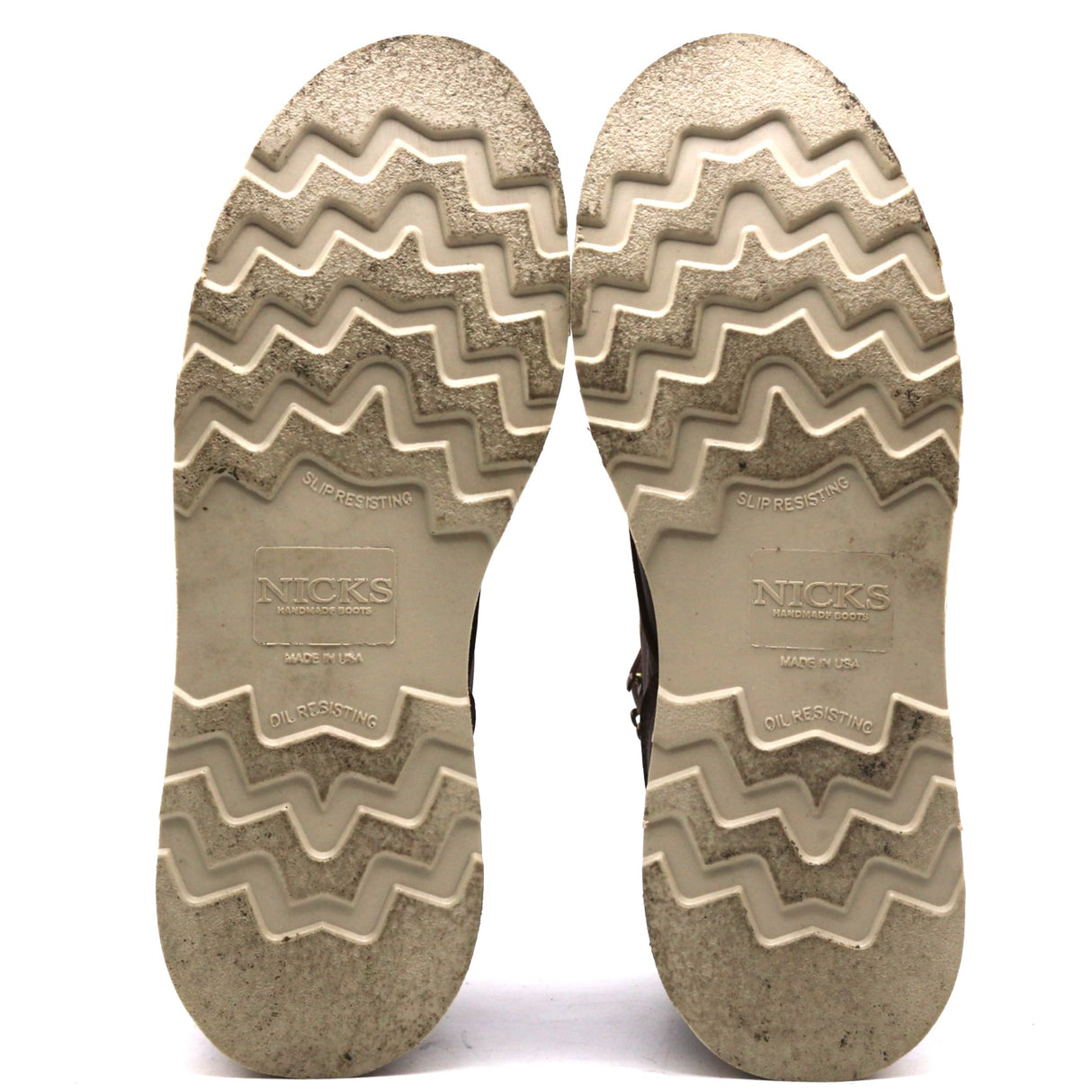 Photographs of a pair of worn wedge outsoles in front of a white background.