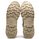 Photographs of a pair of worn wedge outsoles in front of a white background.