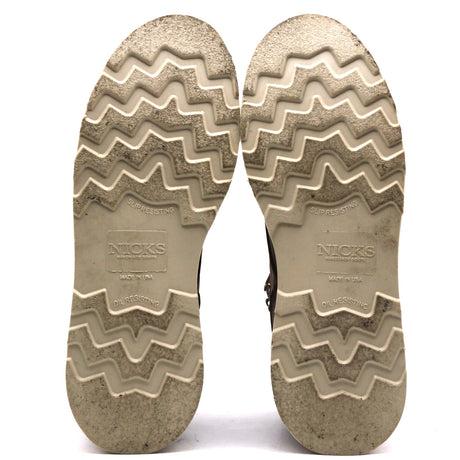 Photographs of a pair of worn wedge outsoles in front of a white background.