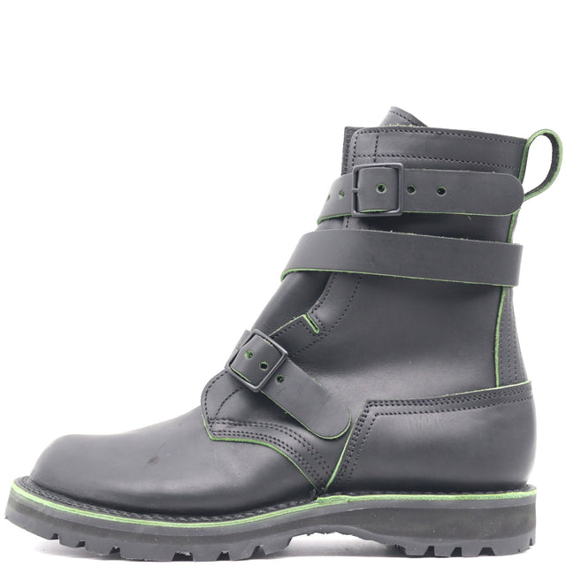 Black Tanker style boot with two buckles and a Sierra outsole in front of a white background.