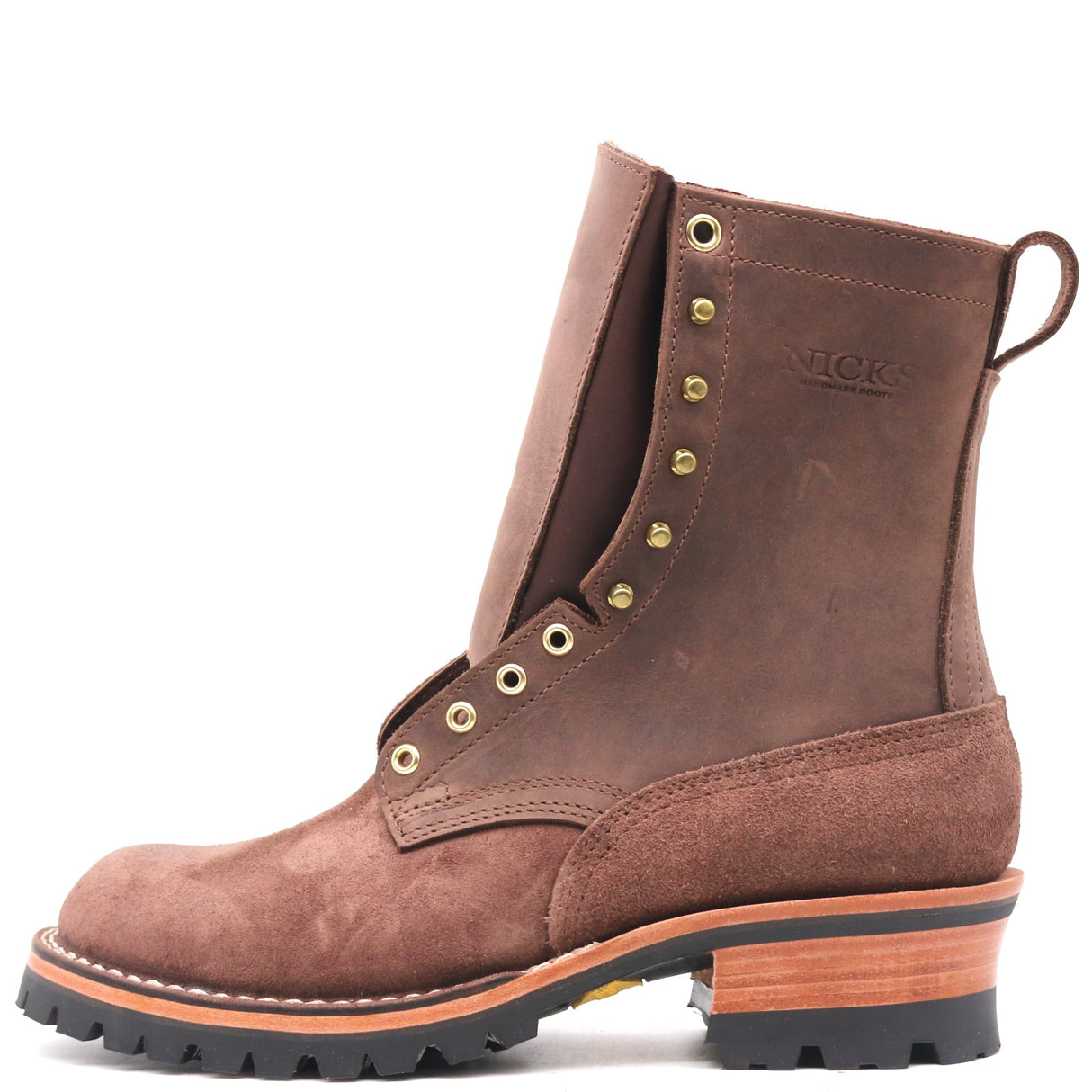 A brown suede and leather ankle boot with gold-tone metal eyelets, a pull loop, and a stacked wood-and-leather heel, shown from a side profile on a white background.