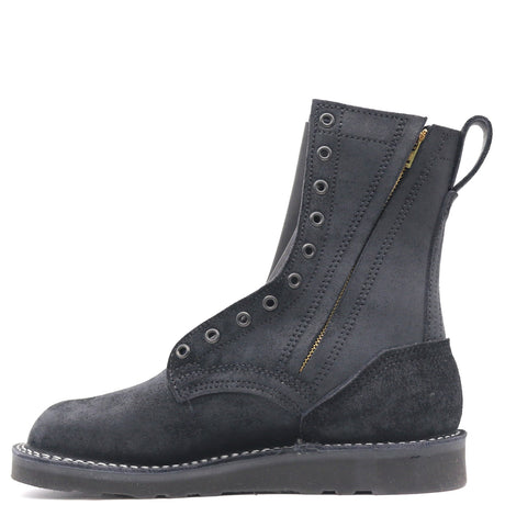 Side profile of the inside of the same boot showing the side zipper. Shown in front of a white background.
