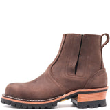 A brown leather Chelsea-style ankle boot with a pull tab, elastic side gore, and a stacked lug sole with a wood-look midsole and black rubber outsole, shown on a plain white background.