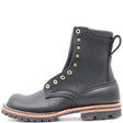 A black leather lace-up ankle boot with brass eyelets, a pull tab, and a rugged lug sole, shown from a side profile on a white background.