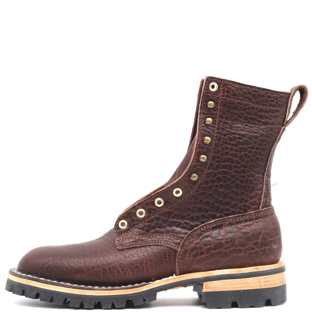 A dark brown textured leather lace-up boot with brass eyelets, a pull tab, and a black lug sole with a light tan midsole, shown against a plain white background.