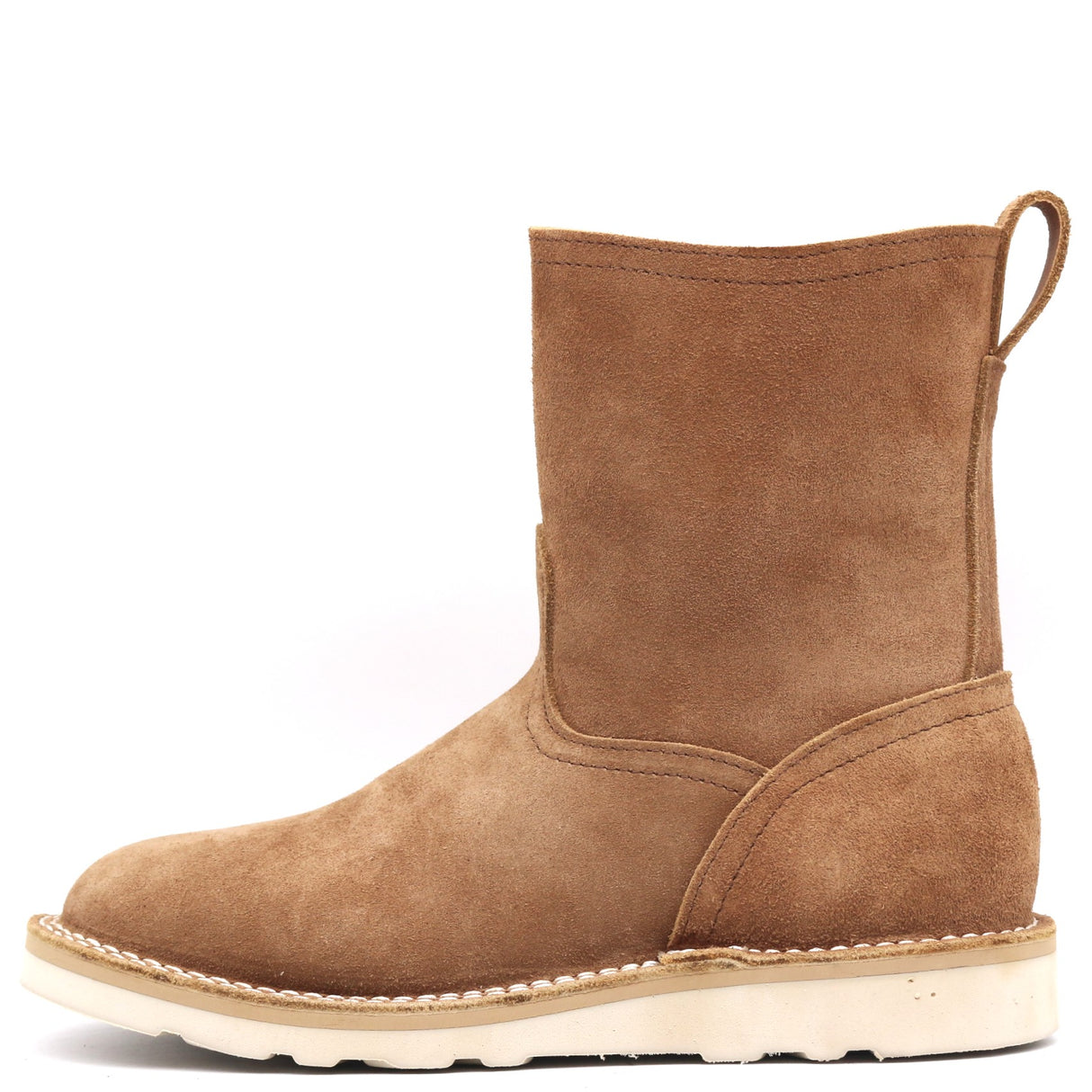 A single mid-calf ankle boot in brown suede, featuring a pull tab at the heel and a thick off-white sole with decorative stitching, shown against a plain white background.