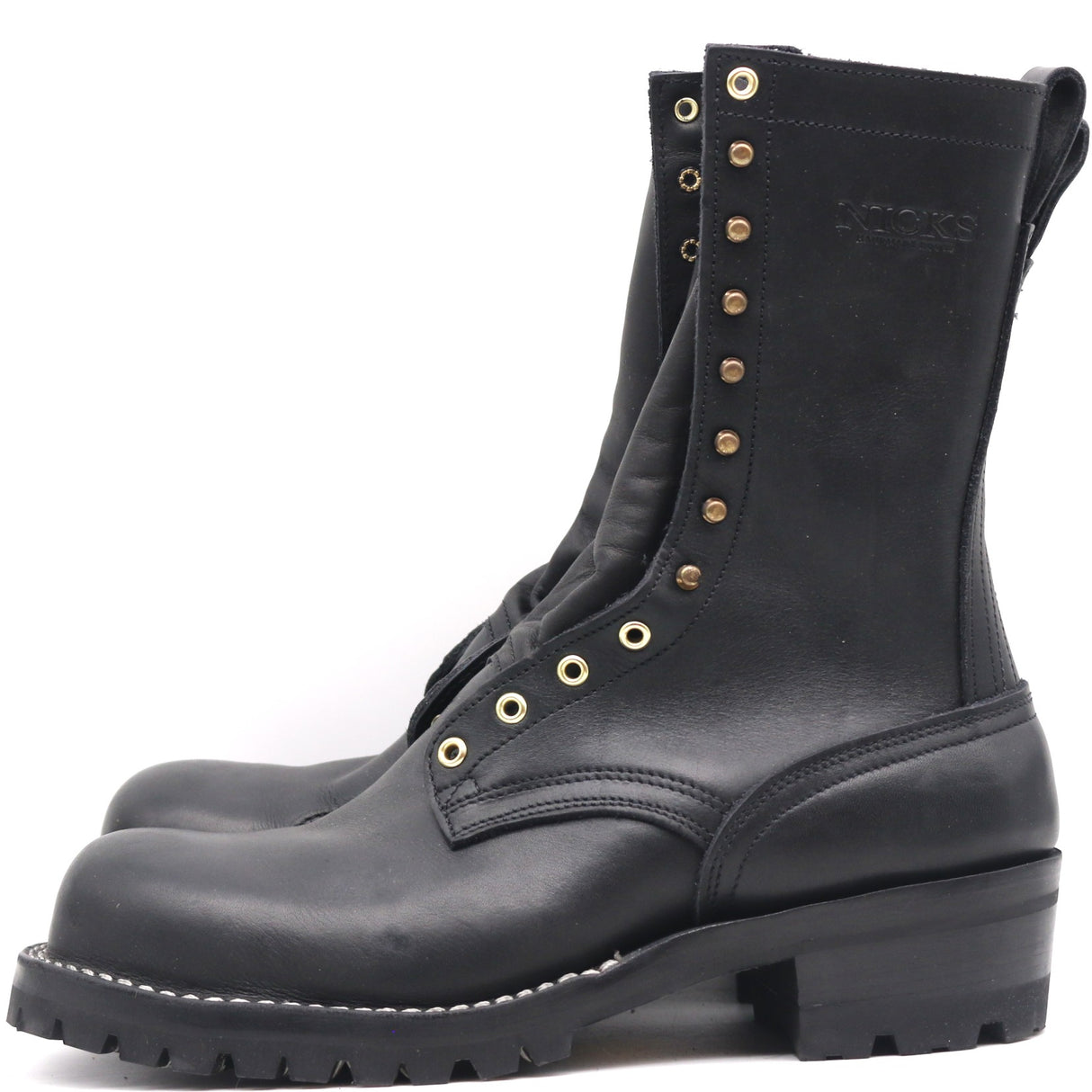 A pair of black leather lace-up boots with brass eyelets and studs, shown from a side profile view against a white background.