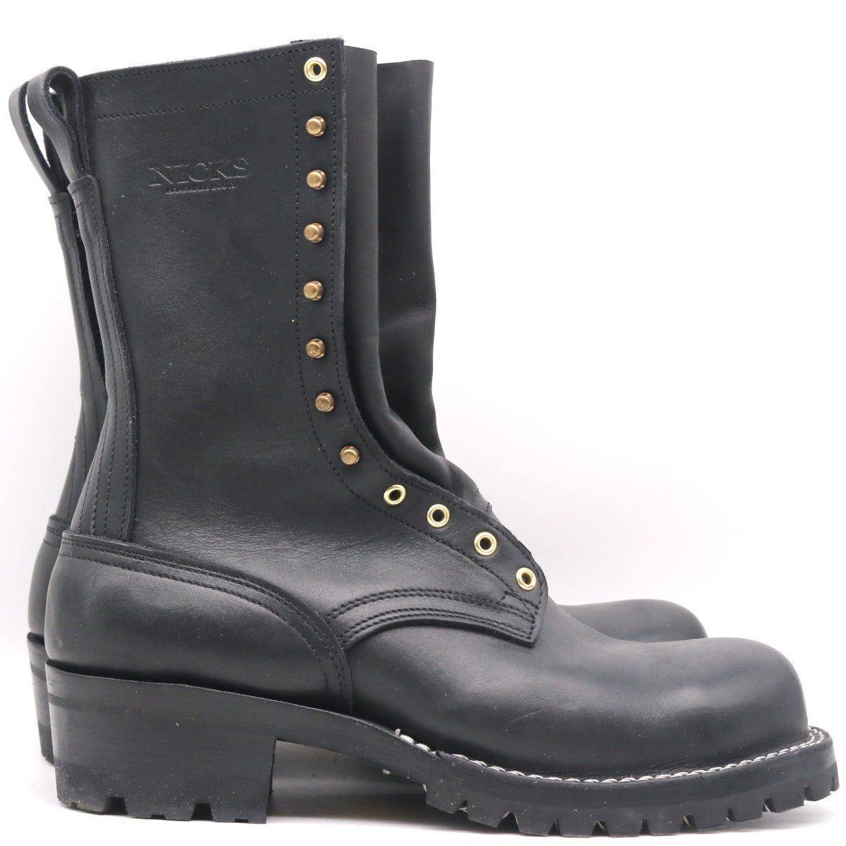 A pair of black leather lace-up boots with brass eyelets and studs, shown from a side profile view against a white background.