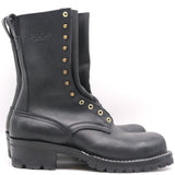 A pair of black leather lace-up boots with brass eyelets and studs, shown from a side profile view against a white background.