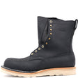 A black leather lace-up work boot with brass eyelets, white contrast stitching, and a light tan sole, shown from a side profile on a white background.
