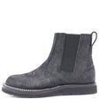 Black pull-on boot with rear pull loop and wedge outsole in front of a white background.