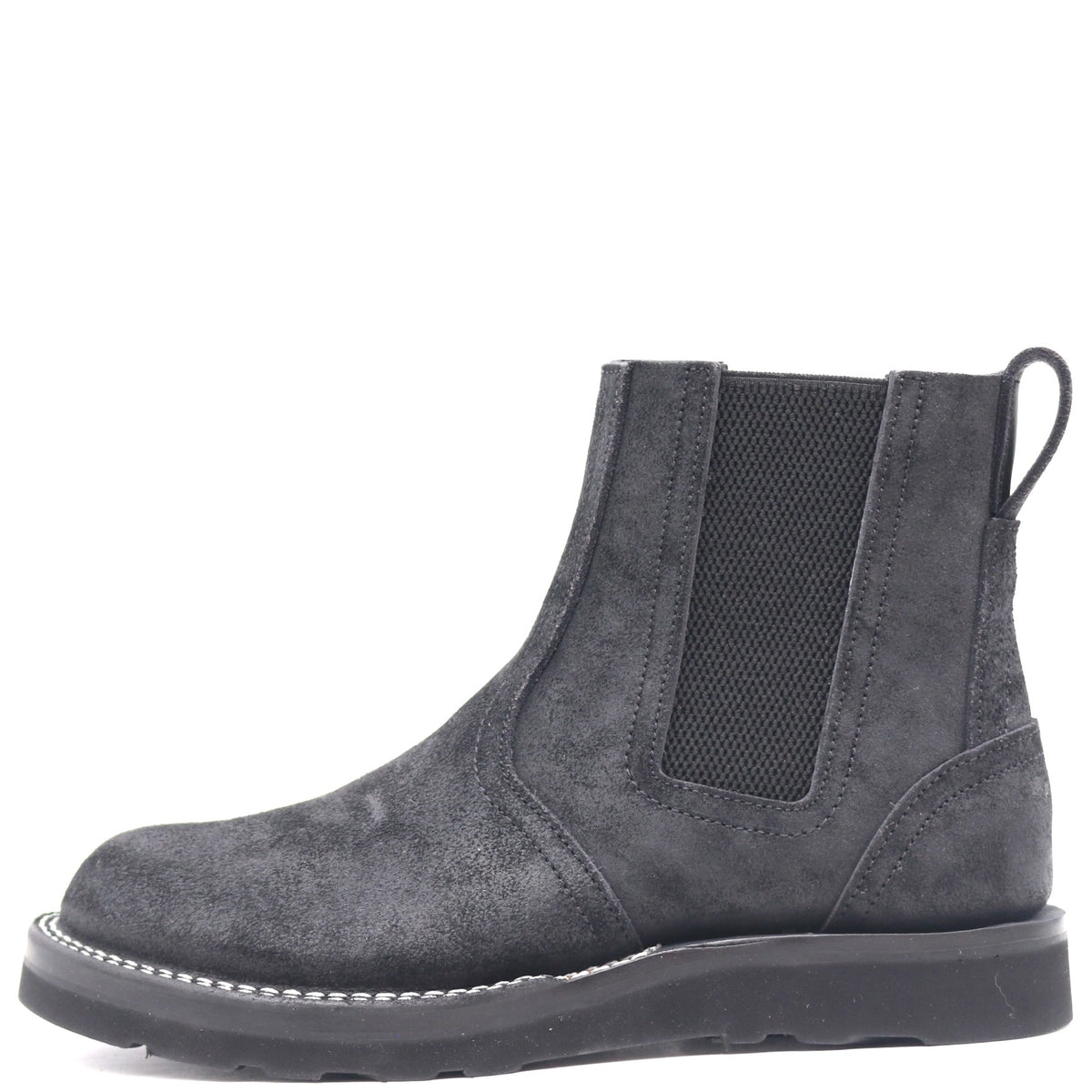 Black pull-on boot with rear pull loop and wedge outsole in front of a white background.