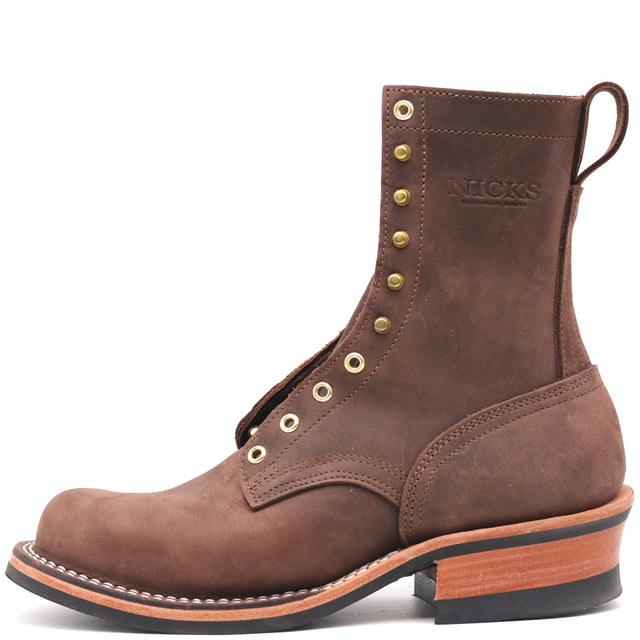 Tall brown lace up boot with brass hardware and a min lug outsole in front of a white background.