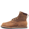Brown zero drop flat boot with padded top and brass hardware in front of a white background.
