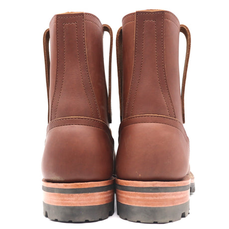 Back view of brown leather Wellington pull-on boots with side loops and stacked soles