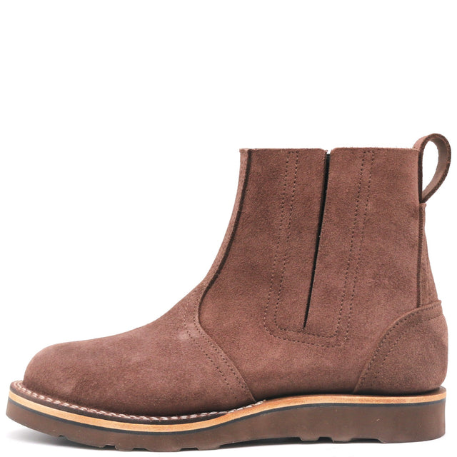 A single brown suede Chelsea-style ankle boot with elastic side panels and a pull loop, shown in side profile on a plain white background.