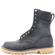 A dark gray suede lace-up boot with gold-tone metal eyelets and studs, featuring a light tan lug sole and white contrast stitching, shown against a plain white background.