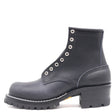 A single dark blue leather lace-up ankle boot with silver metal eyelets, a chunky black block heel, and a rugged lug sole, shown from a side profile on a white background.