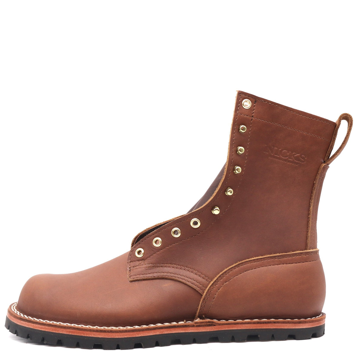 Flat brown leather boot with brass hardware and flat outsole in front of a white background.