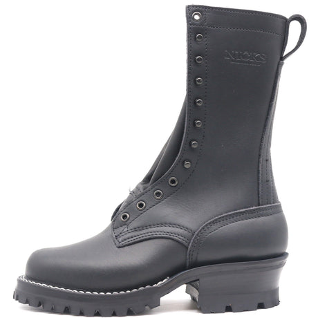 A black leather lace-up work boot with a chunky lug sole and a pull tab, shown from a side profile on a white background. The brand name 'NICKS' is embossed on the side of the shaft.