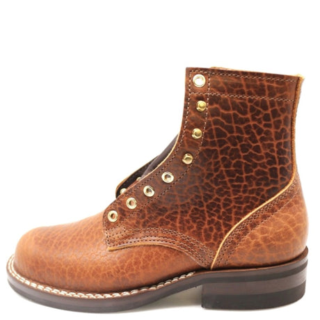 A single brown leather lace-up boot with a textured, cracked finish on the upper, contrast stitching, brass eyelets, and a dark sole, shown against a plain white background.