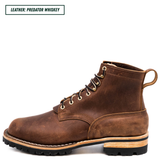 A single brown leather lace-up boot shown in side profile on a white background, with a text label in the top-left corner reading 'LEATHER: PREDATOR WHISKEY'. The boot has a distressed cognac-brown leather upper, tan stitching, metal eyelets, a pull loop, and a rugged black sole with a light tan midsole section.