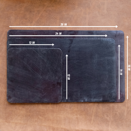 Three brown leather work mats laying on lighter surface. Small mat has measurement of 12"x12", medium is 14"x24", large is 16"x26".
