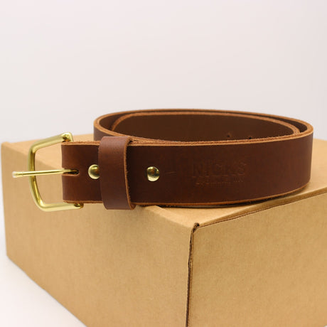 Brand new, 36" brown belt with brass hardware