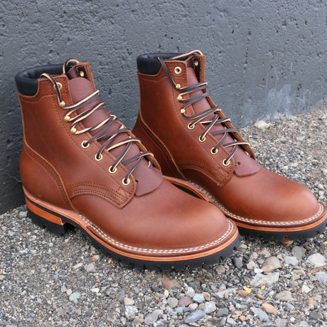 1964 brown color boot with aggressive sole.  6 inches tall.
