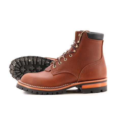 1964 brown color boot with aggressive sole.  6 inches tall.