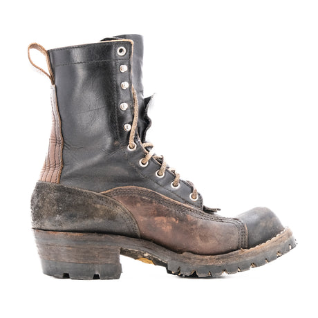Eight tall black leather boot with rubber sole.
