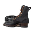 Black hooligan in black roughout over smooth
