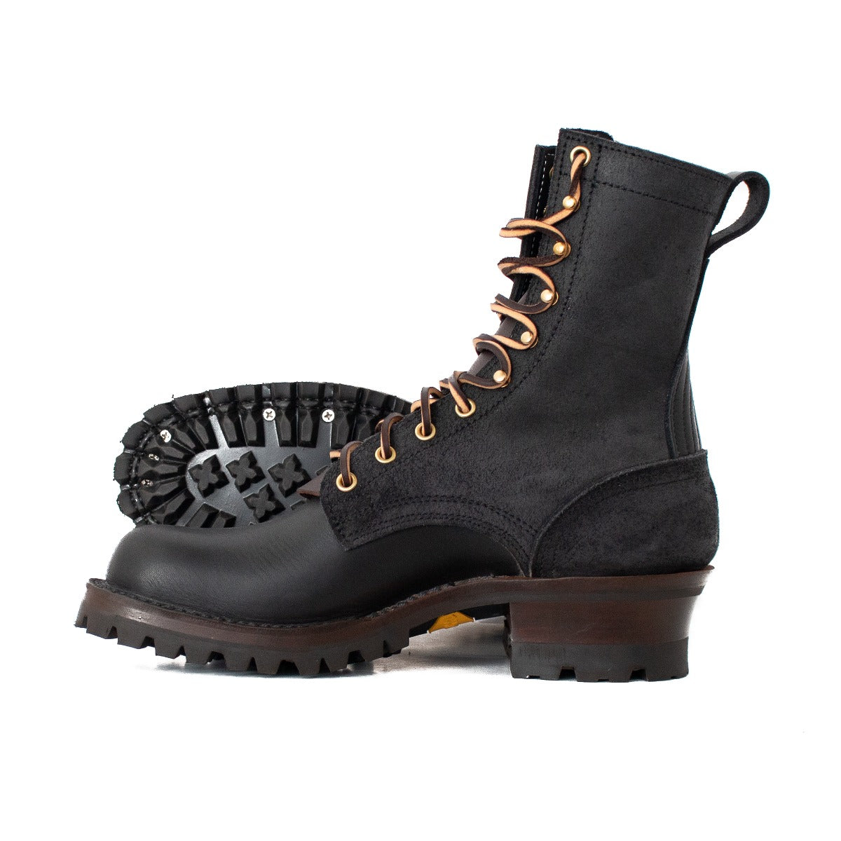 Black hooligan in black roughout over smooth