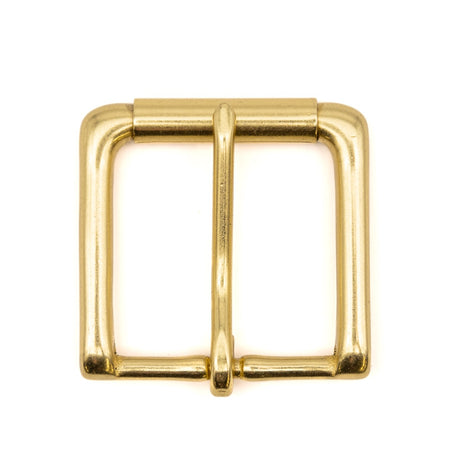 Detail shot of a solid brass buckle , highlighting their durable construction and classic golden sheen.