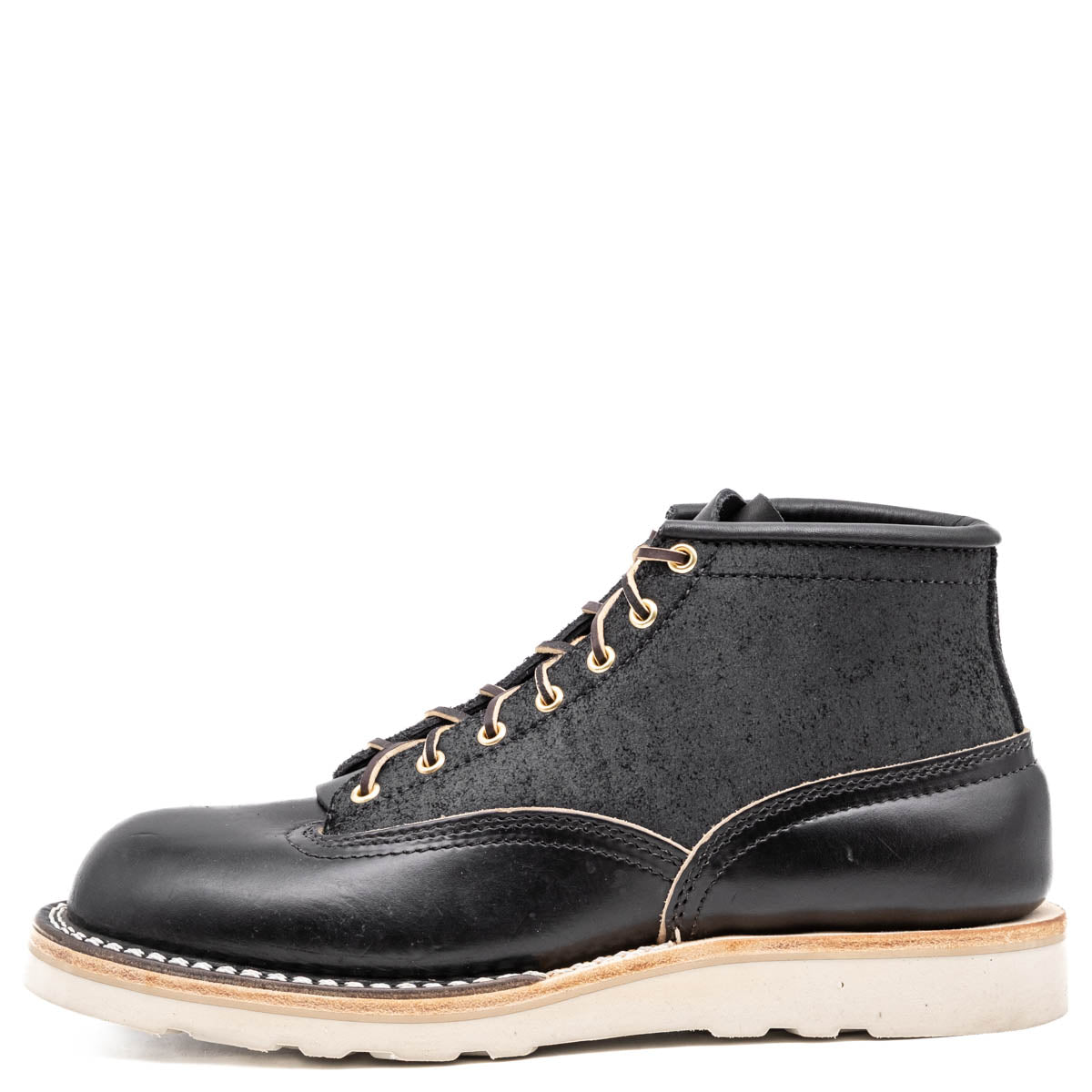 Black leather boot with white sole on a white background